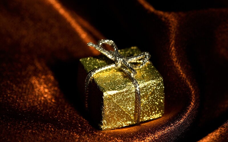 golden gift box with ribbon