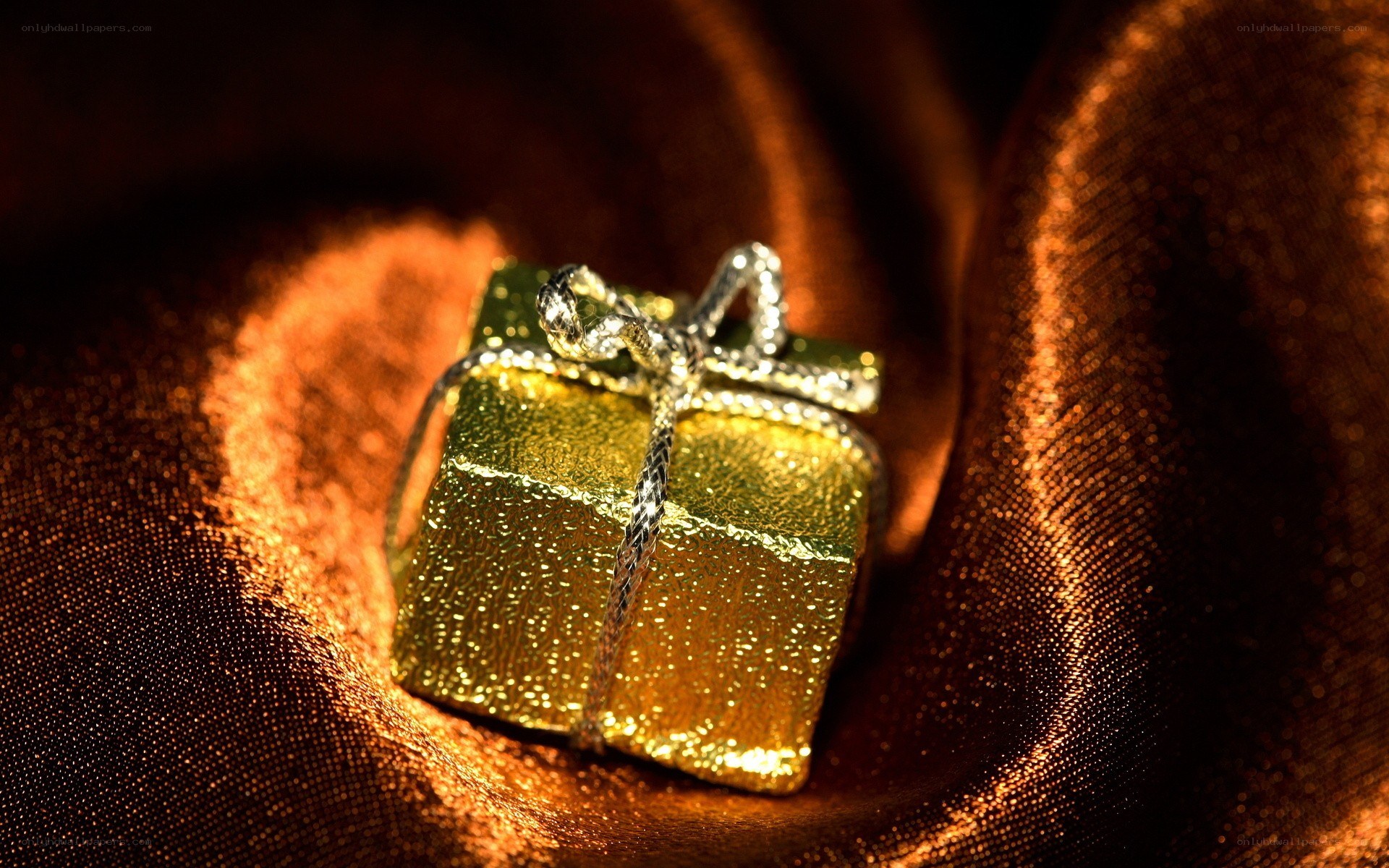 golden gift box with ribbon
