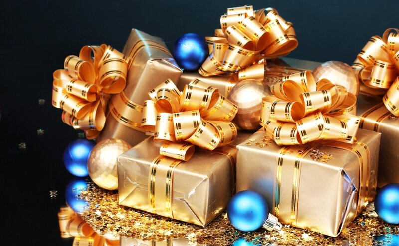 Golden gift boxes with bows