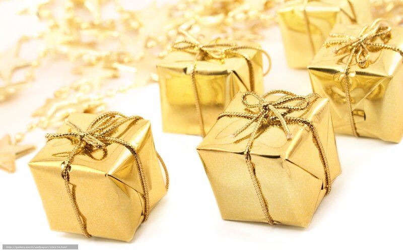 Golden gift boxes with ribbons
