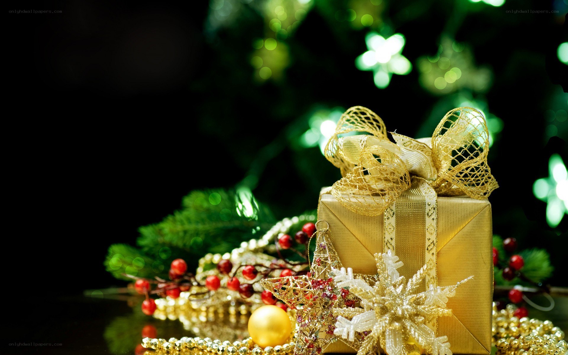 Golden gift under Christmas tree