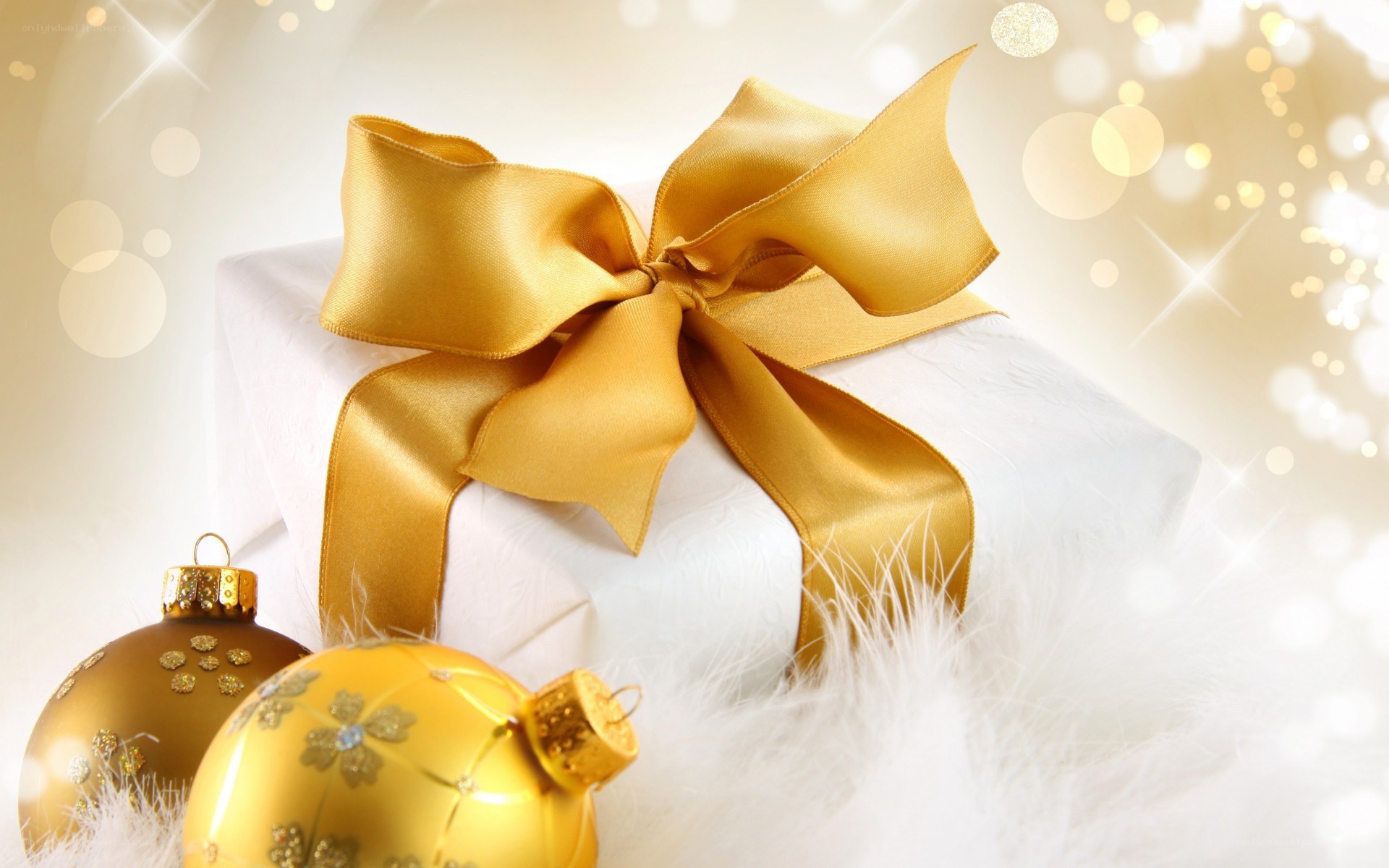 Golden gift with ornaments