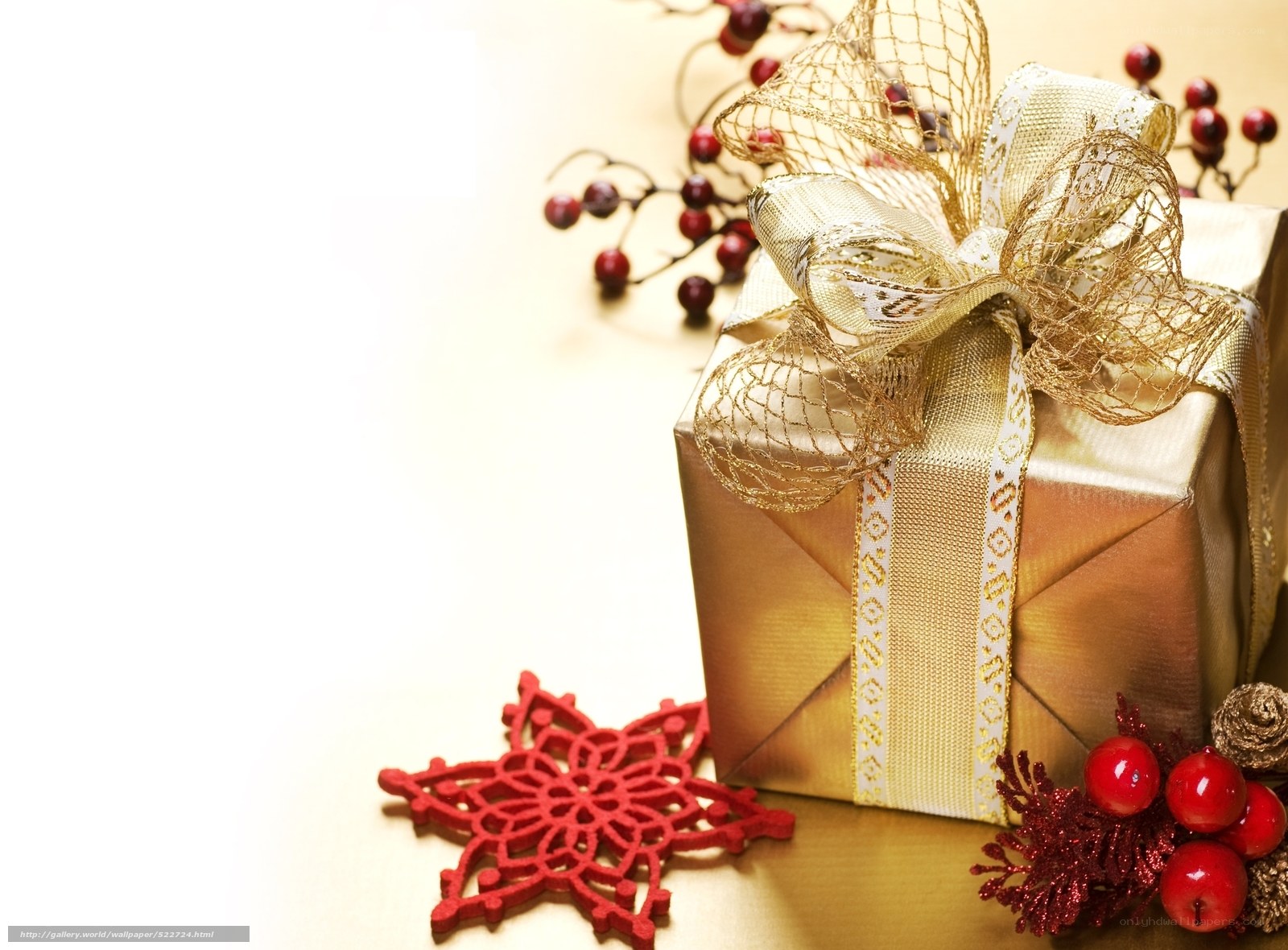 golden gift with red ornaments