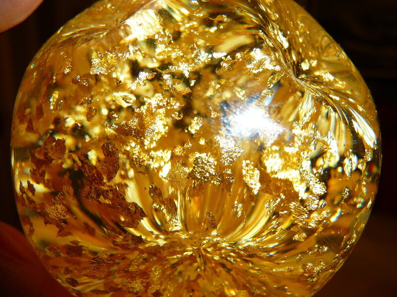 golden glass sphere with foil