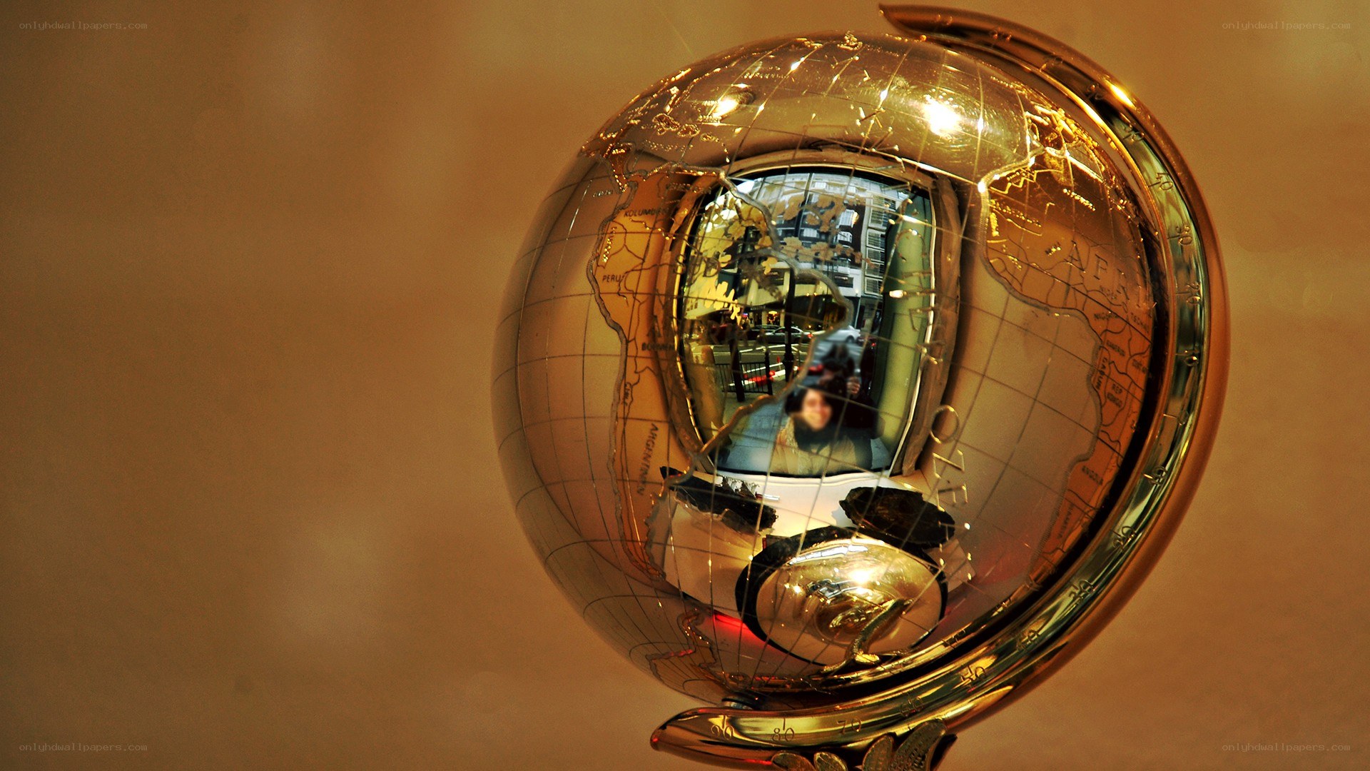golden globe with reflection