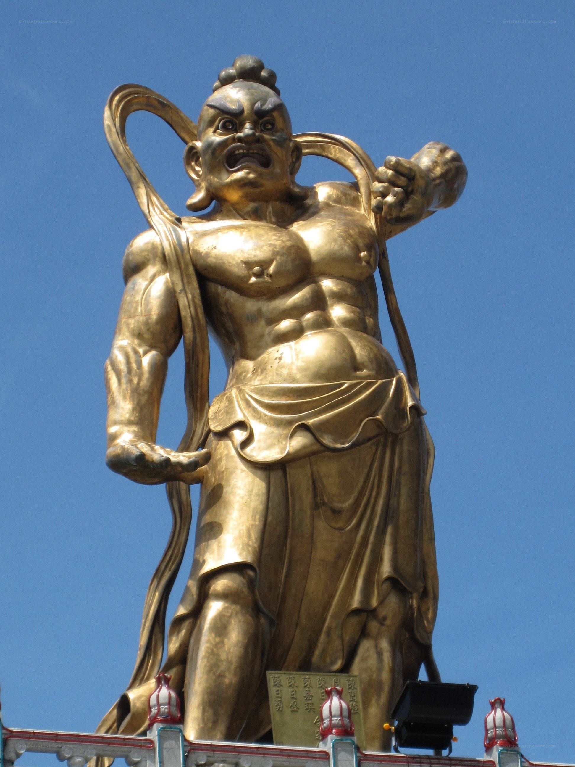 Golden guardian statue