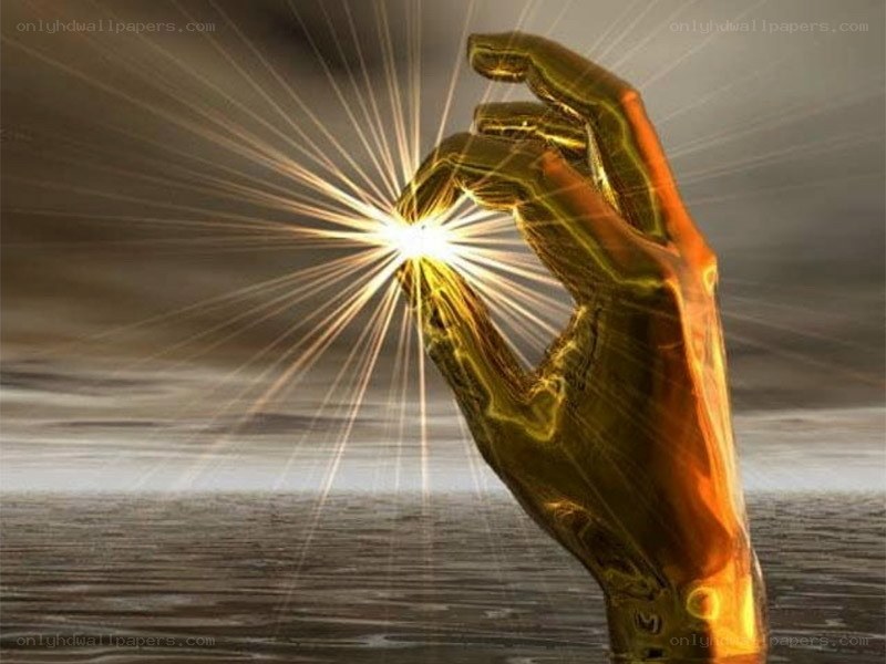 golden hand holding light