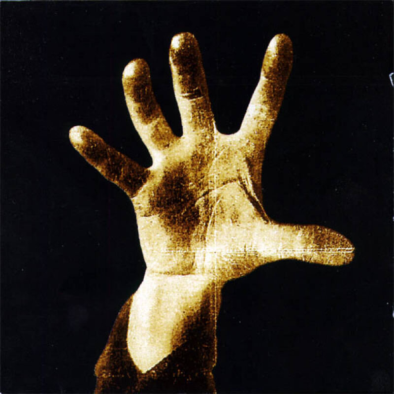 golden hand print on black