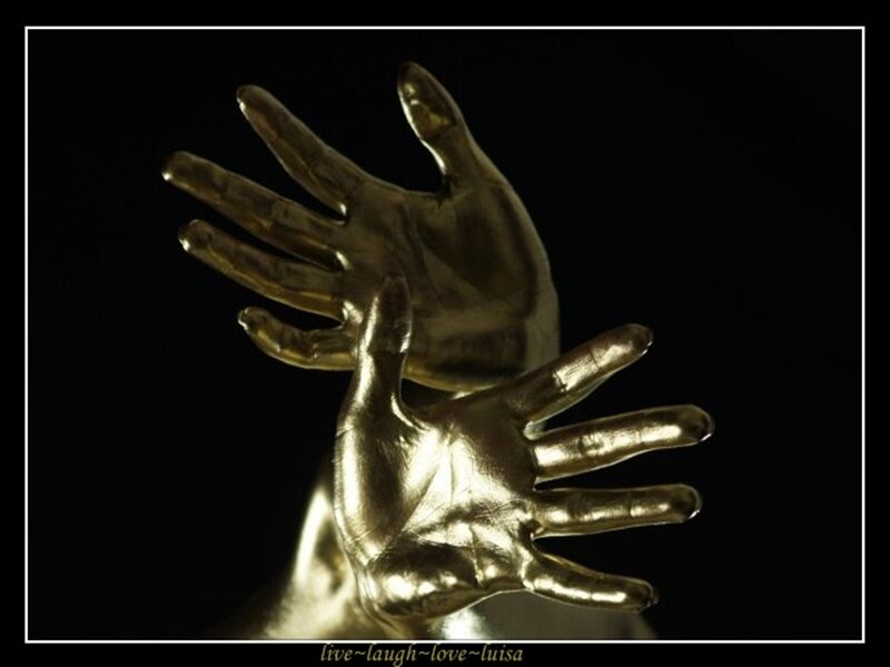 Golden Hands Sculpture