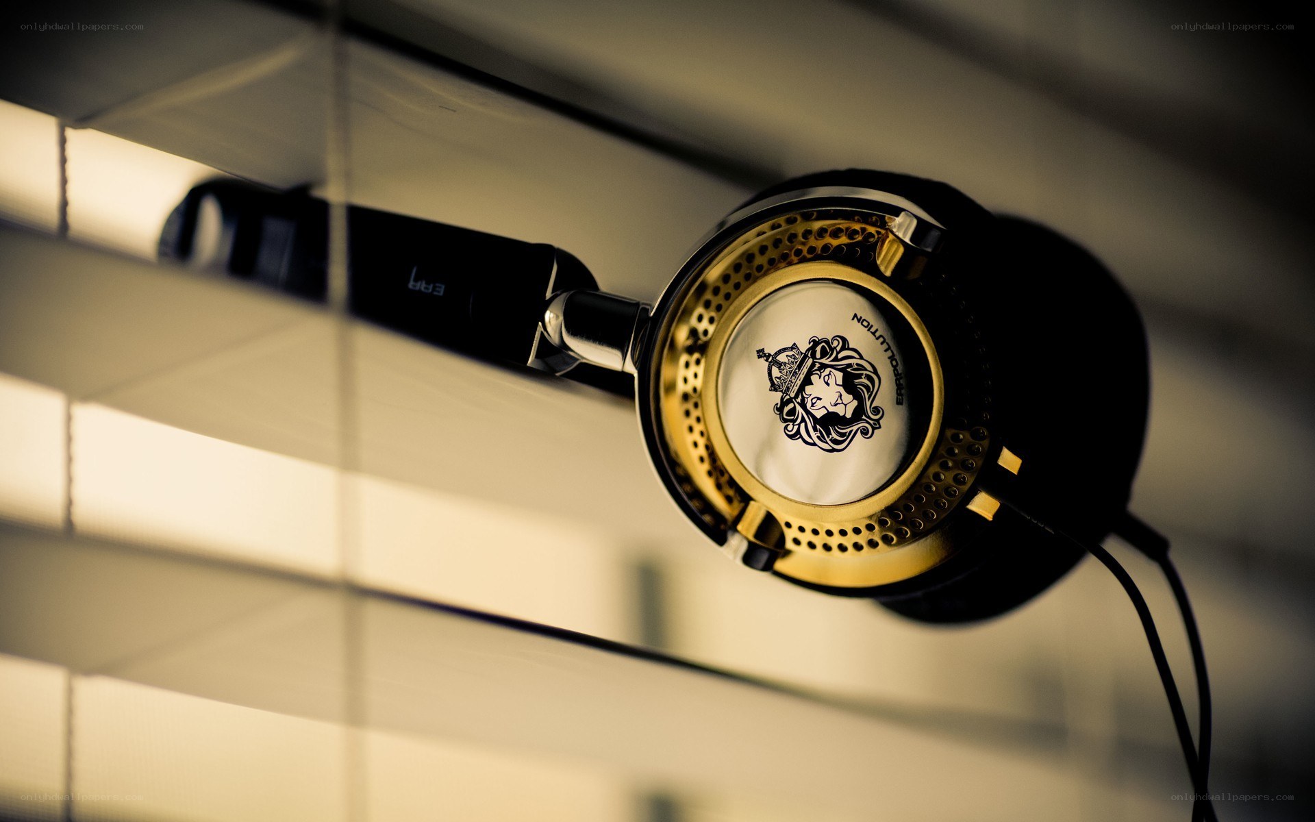 golden headphones on display