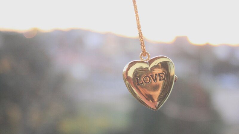 golden heart pendant with love