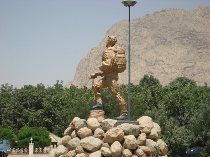 Golden Hiker Statue