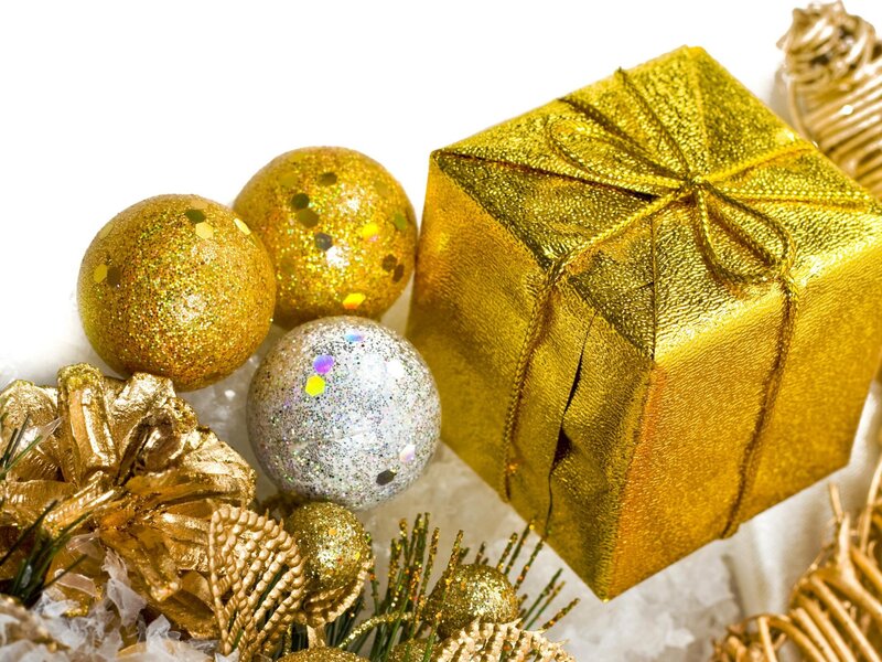 Golden holiday gift and ornaments