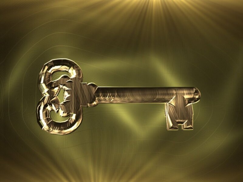 golden key with radiant background