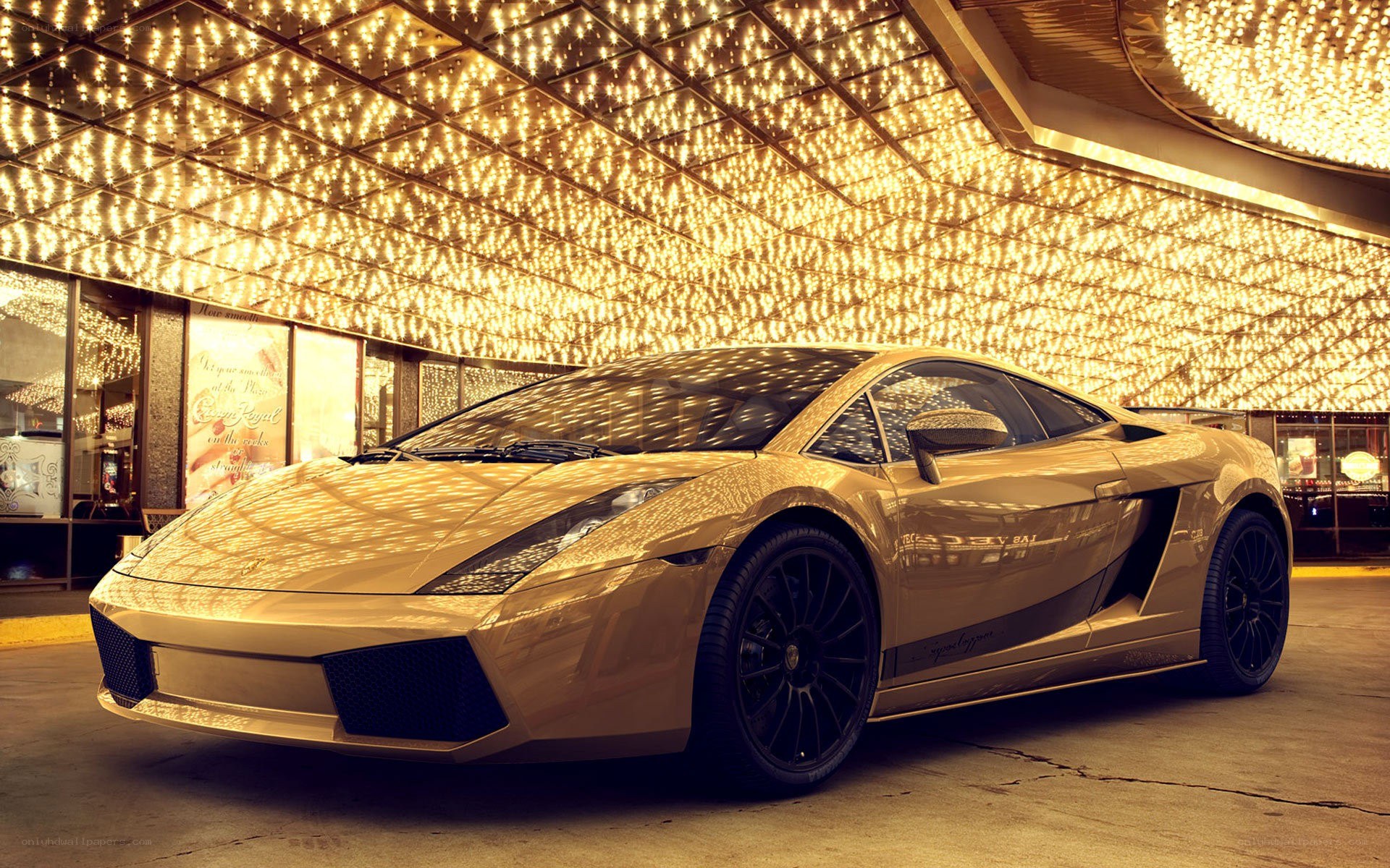 golden Lamborghini at night