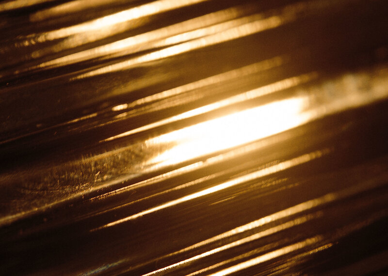 golden light on corrugated surface