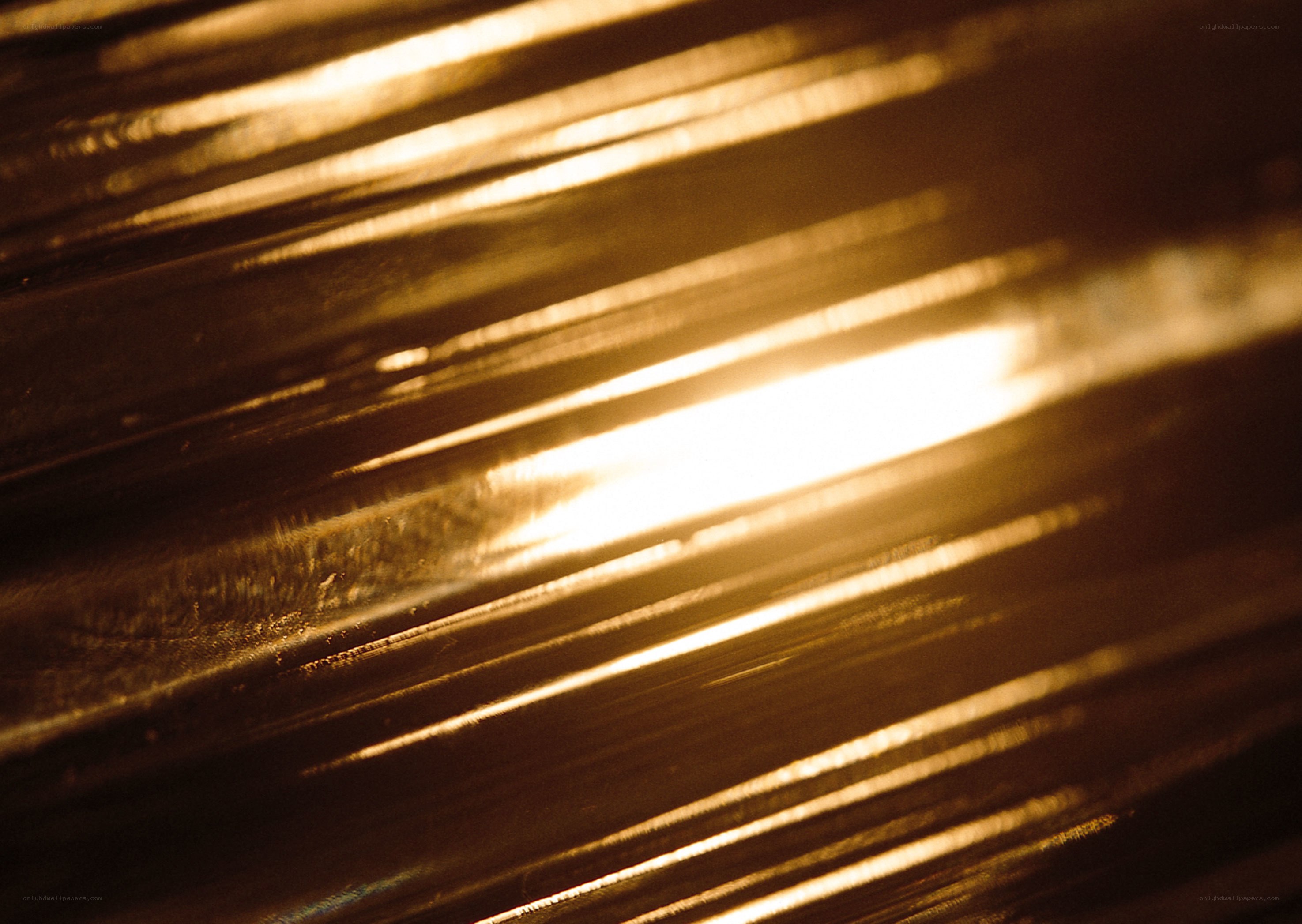golden light on corrugated surface