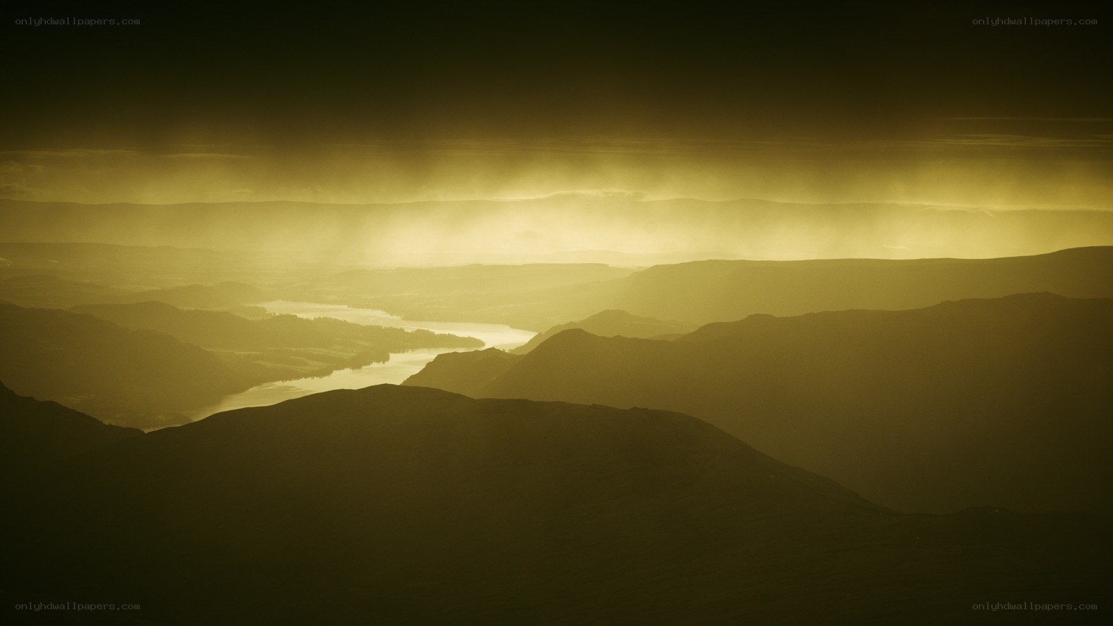 Golden light over mountain valley