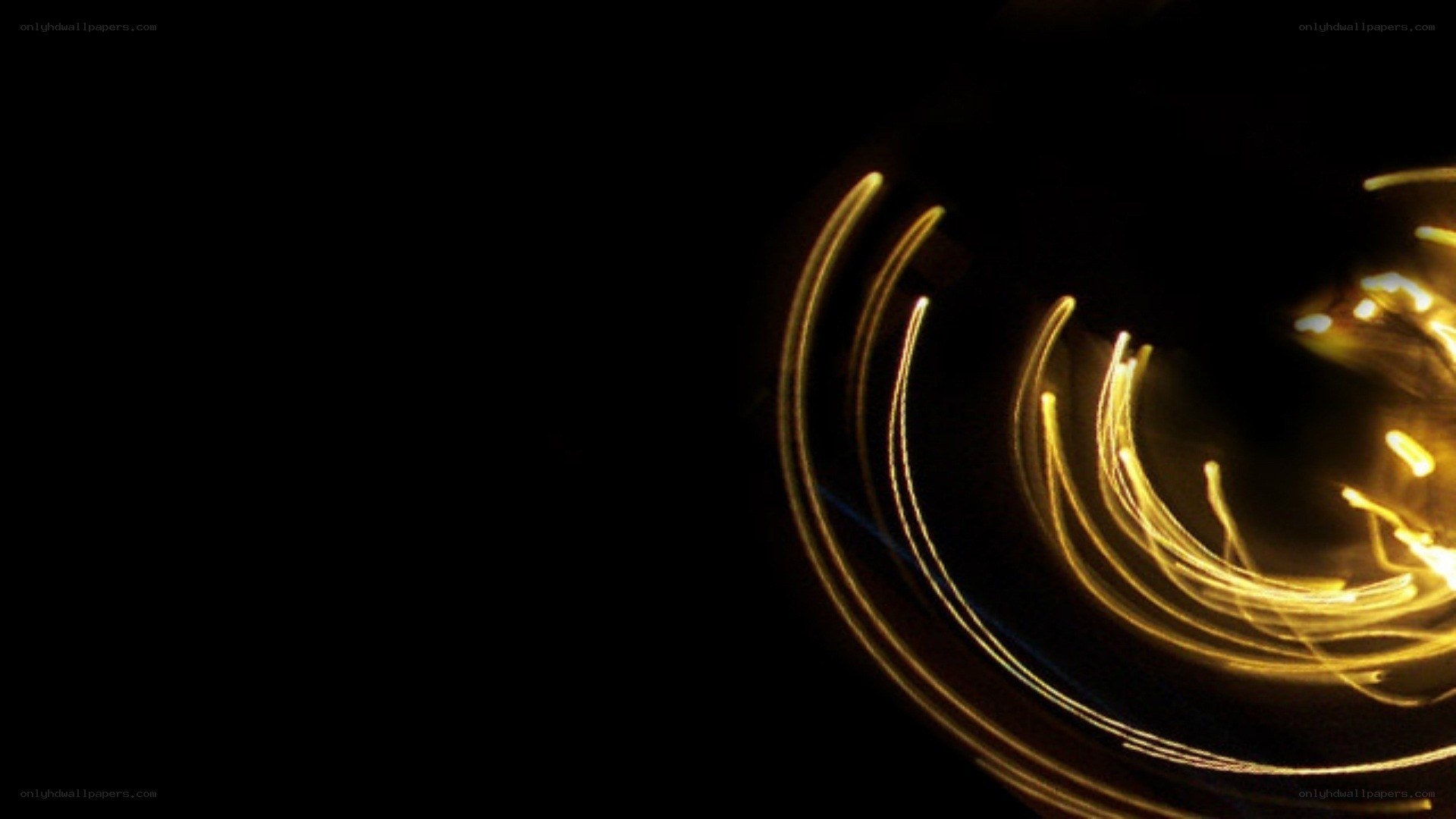 golden light trails in darkness