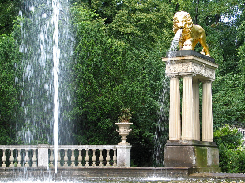 Golden lion fountain in garden