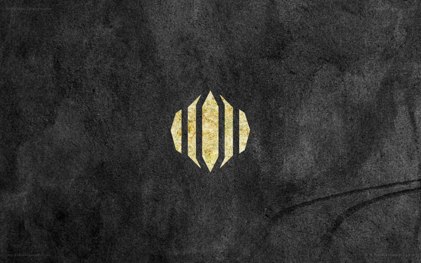 golden logo on dark background