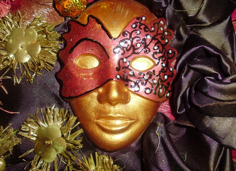 Golden Mask with Red Overlay