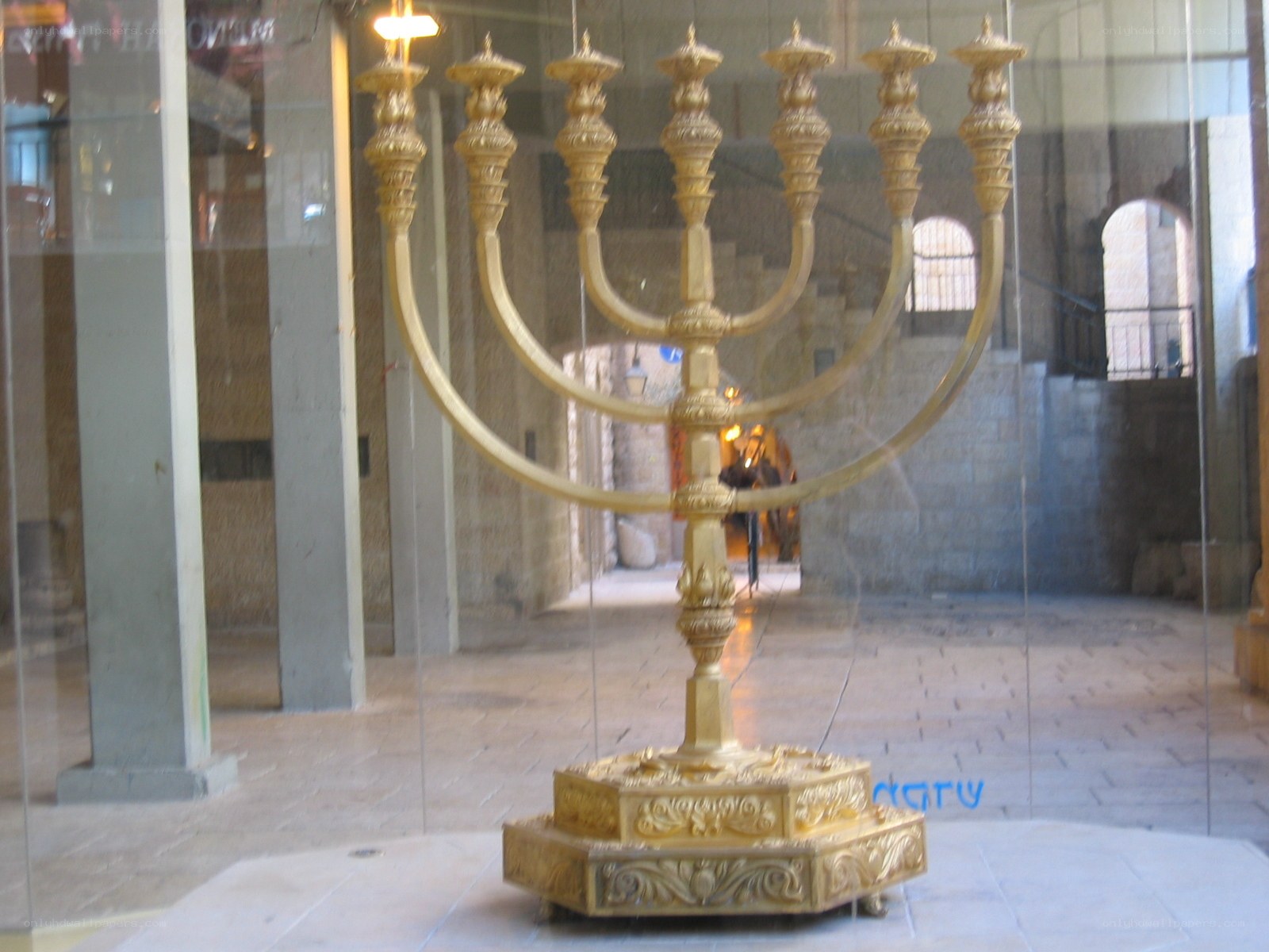 Golden menorah in display case