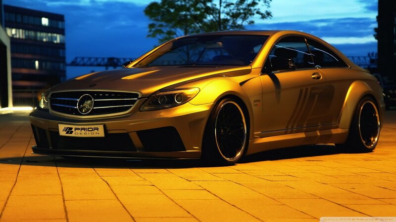 golden mercedes coupe at night