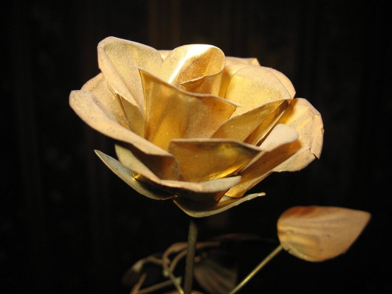 golden metal rose sculpture