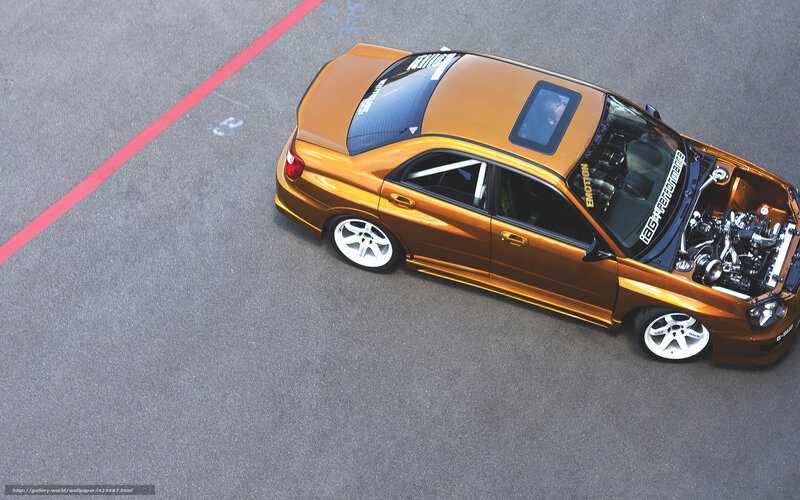 golden modified car with open hood