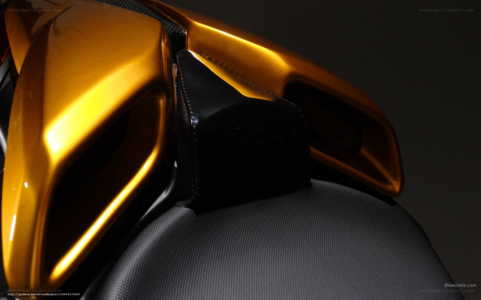 golden motorcycle seat detail