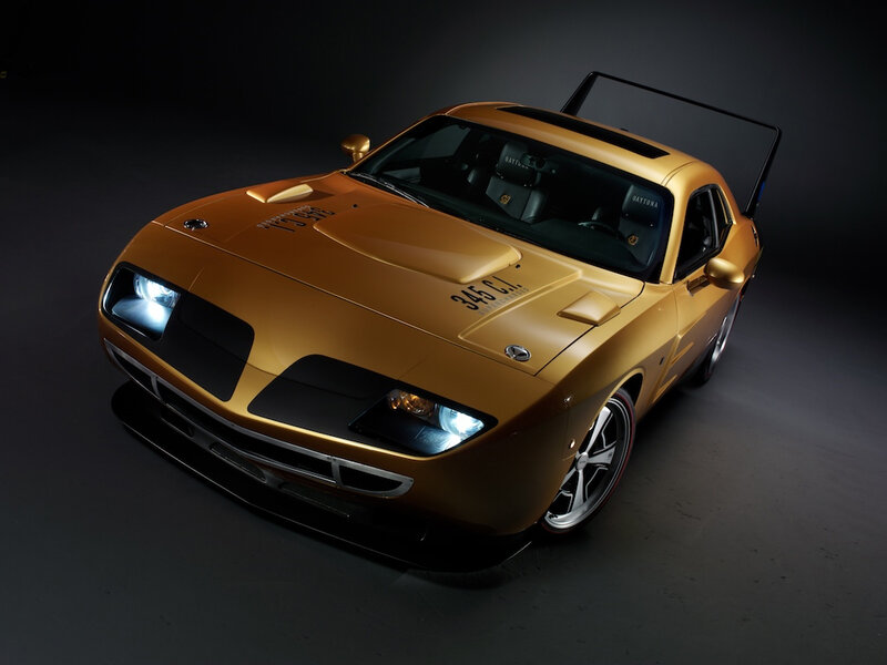 golden muscle car with open door