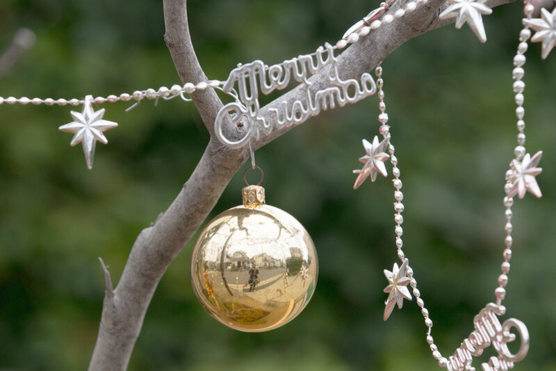 Golden Ornament on Branch — Gold