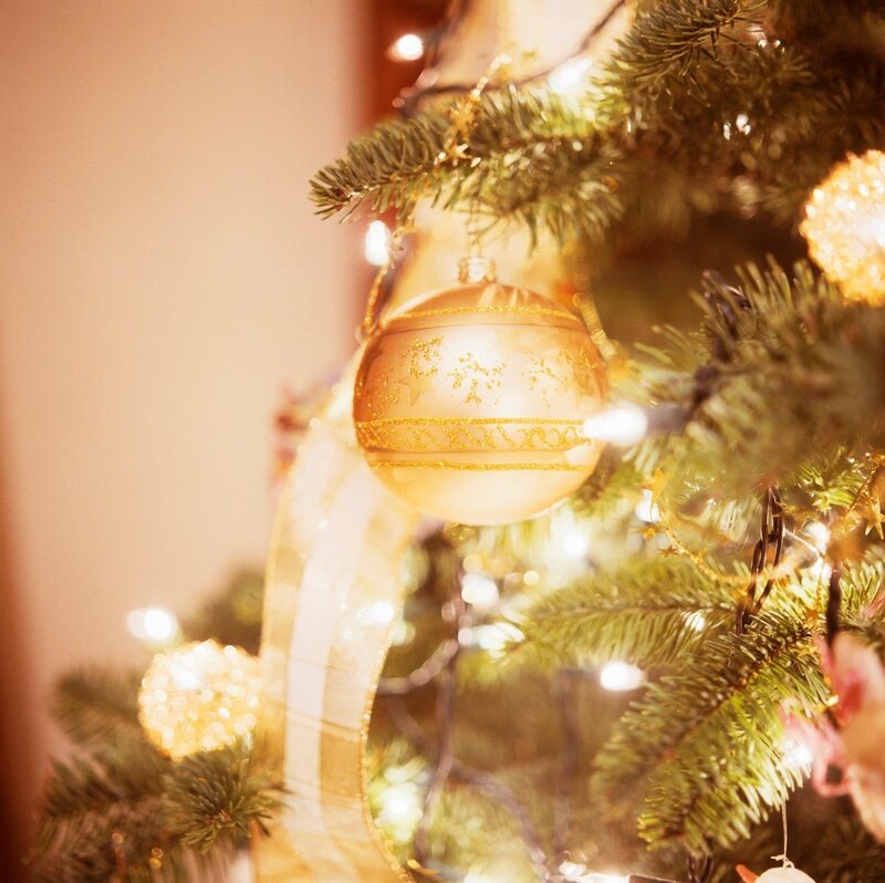 Golden ornament on Christmas tree