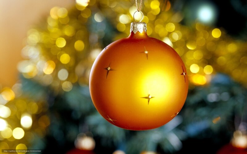 Golden ornament on Christmas tree