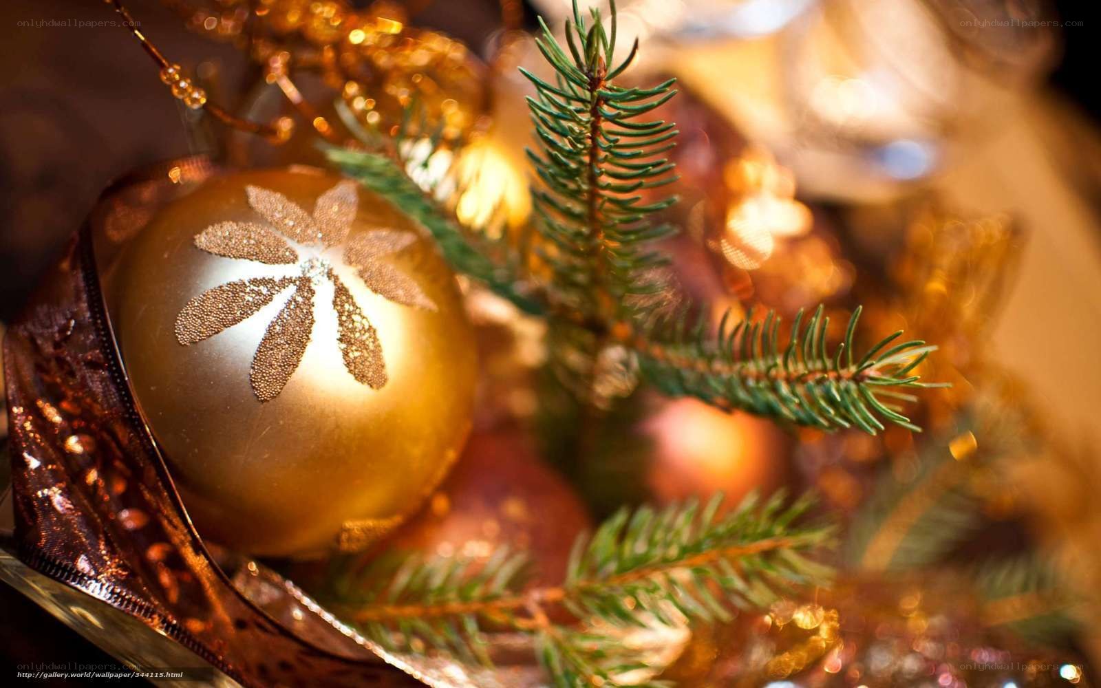 Golden ornament with pine branch