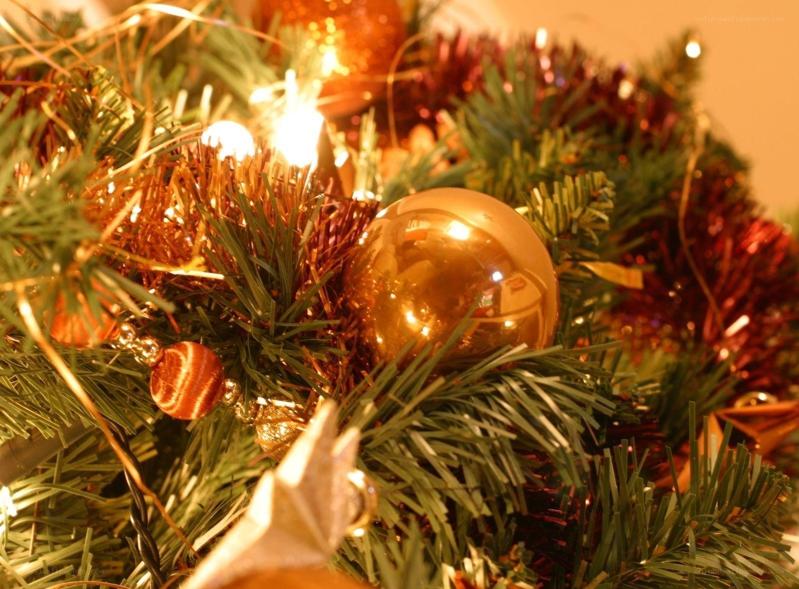 Golden ornaments on a Christmas tree