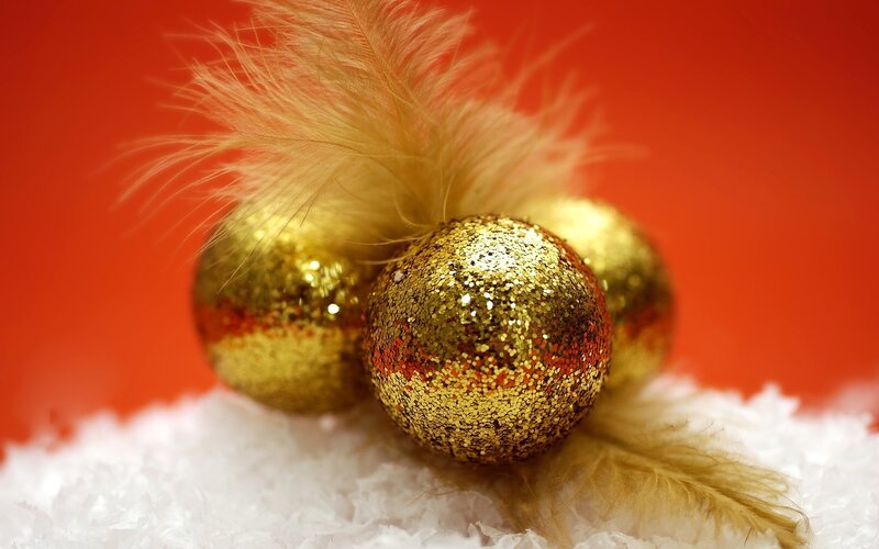 Golden ornaments with feathers