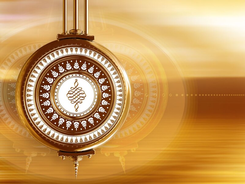 golden ornate pocket watch