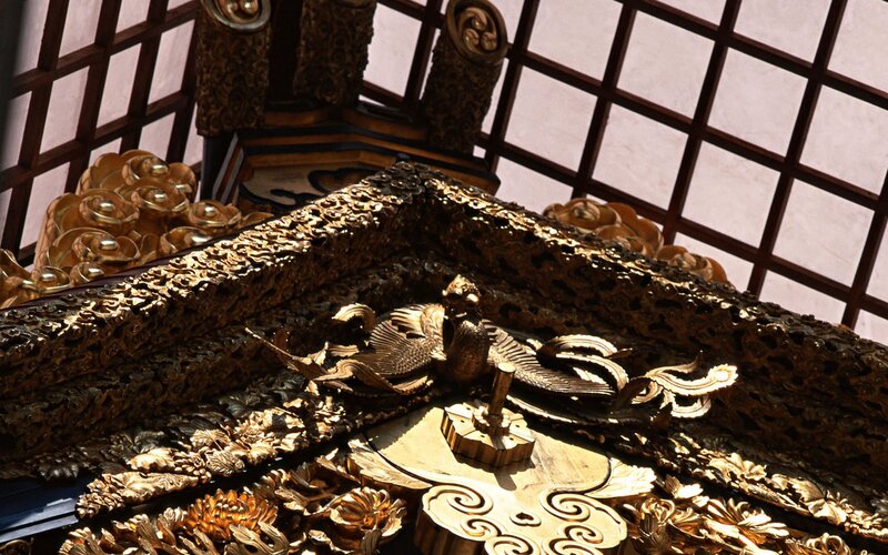 Golden ornate temple carving