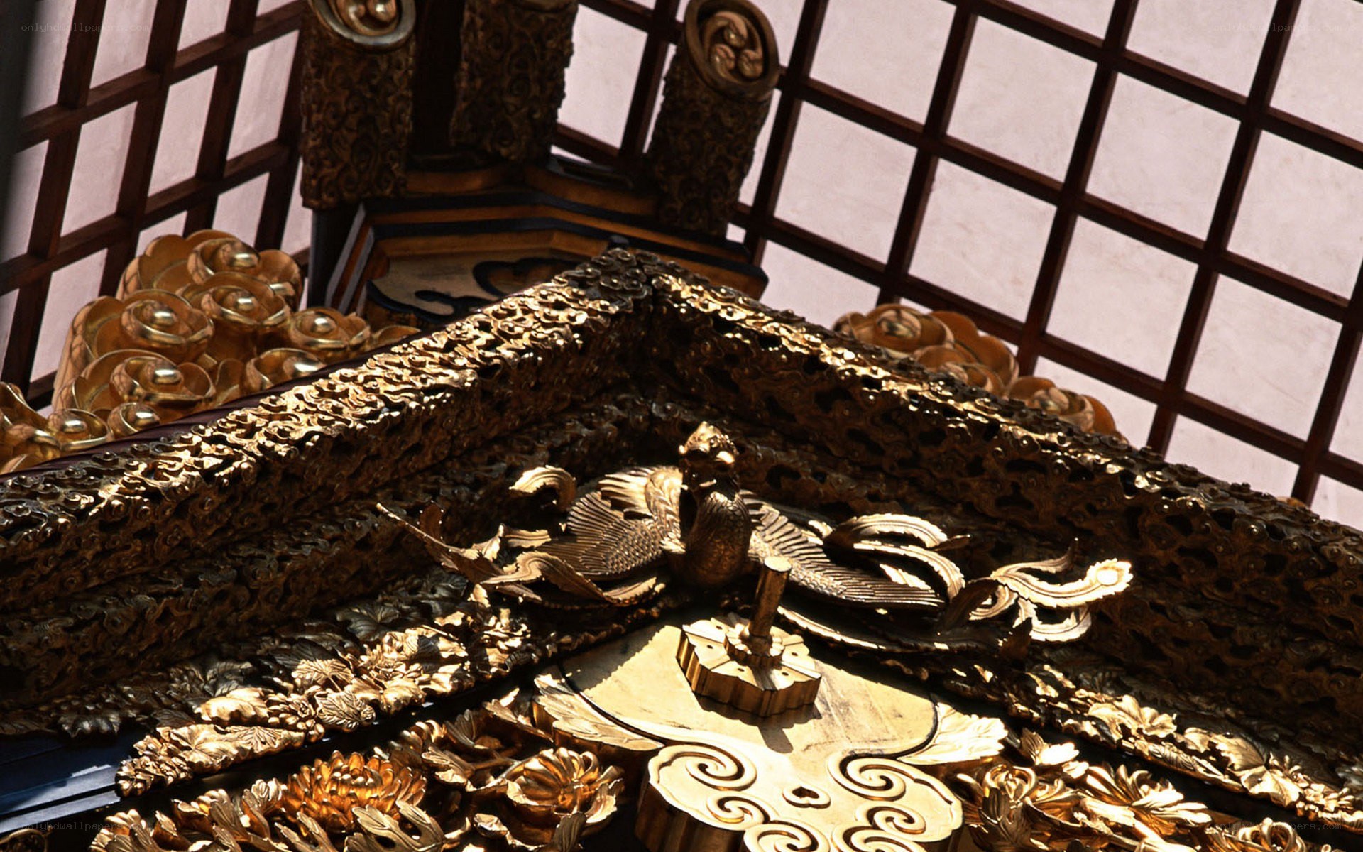 Golden ornate temple carving