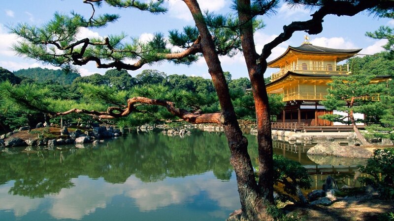 Golden Pavilion by a tranquil pond