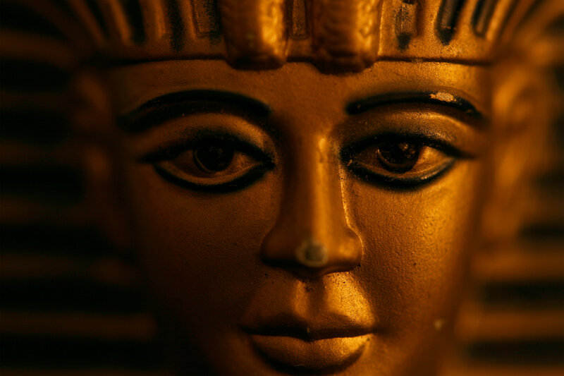 golden pharaoh statue close-up
