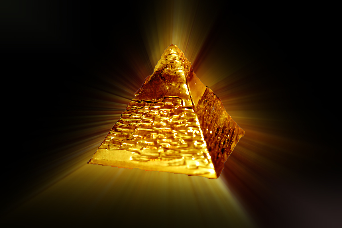 golden pyramid with radiant light