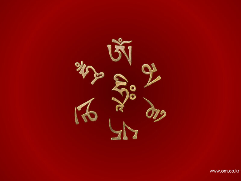 Golden Sanskrit symbols on red