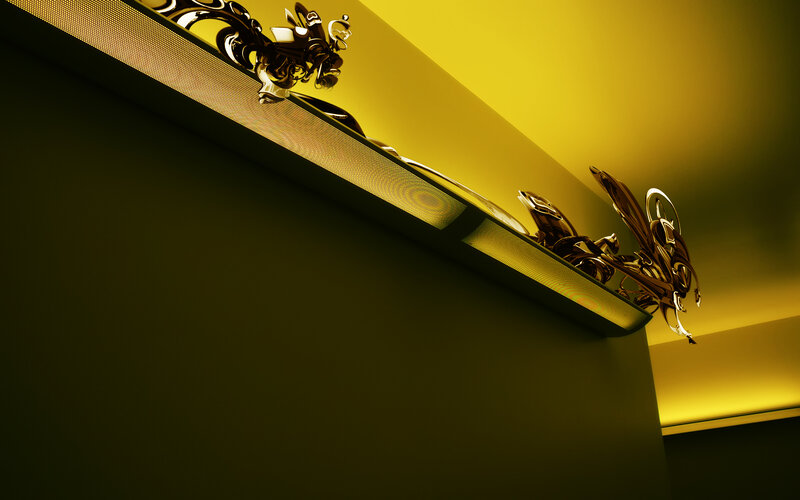 Golden sculpture on illuminated shelf