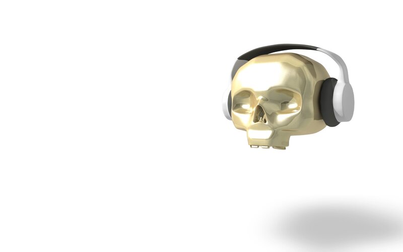 golden skull with headphones