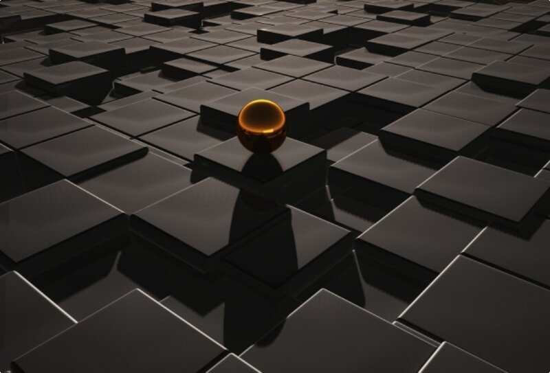 golden sphere on black cubes