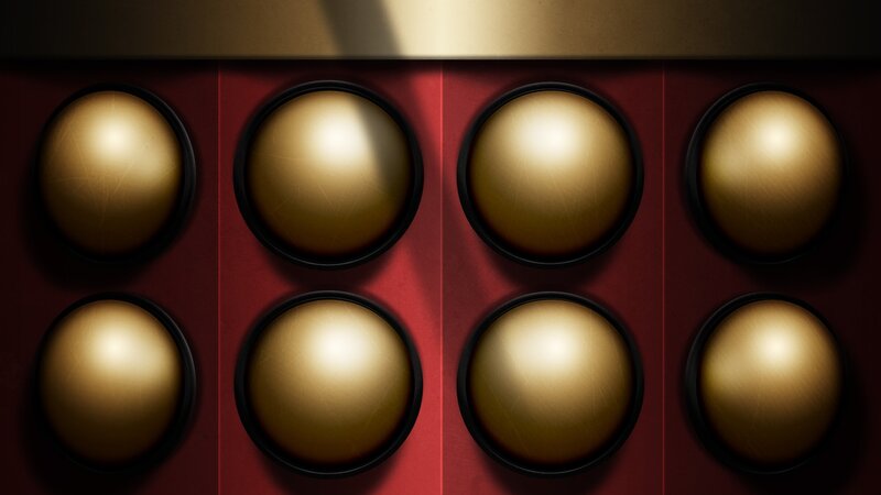 Golden Spheres in Red Case