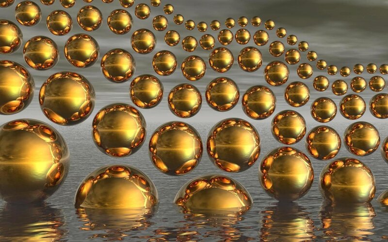 Golden Spheres in Water